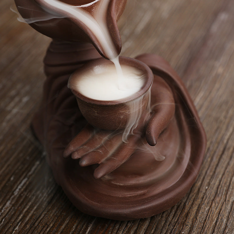 Zen-Inspired Handheld Teapot for Aromatherapy and Relaxation