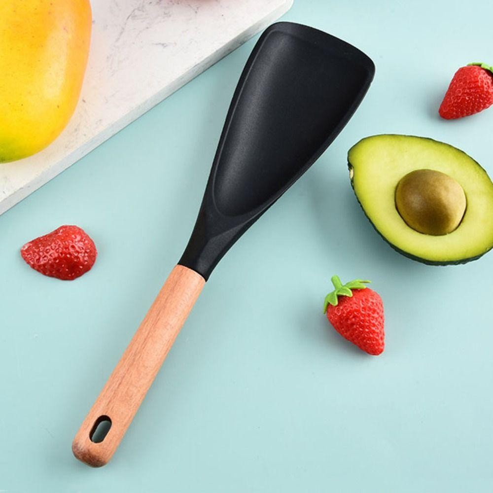 Versatile Kitchen Spoon Tool for Cooking and Serving
