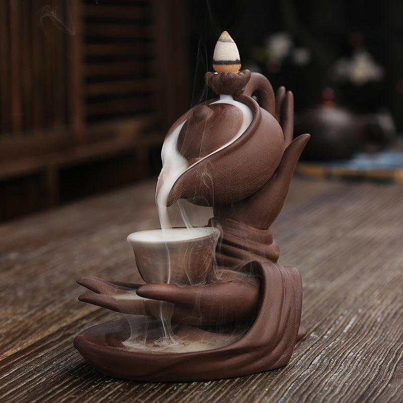 Zen-Inspired Handheld Teapot for Aromatherapy and Relaxation