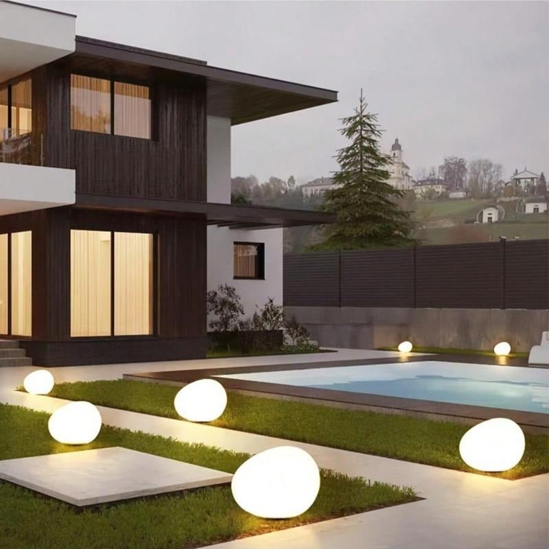 LumaGlow™ - Solar Stone Garden Light