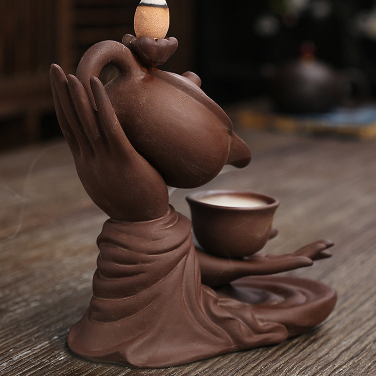 Zen-Inspired Handheld Teapot for Aromatherapy and Relaxation