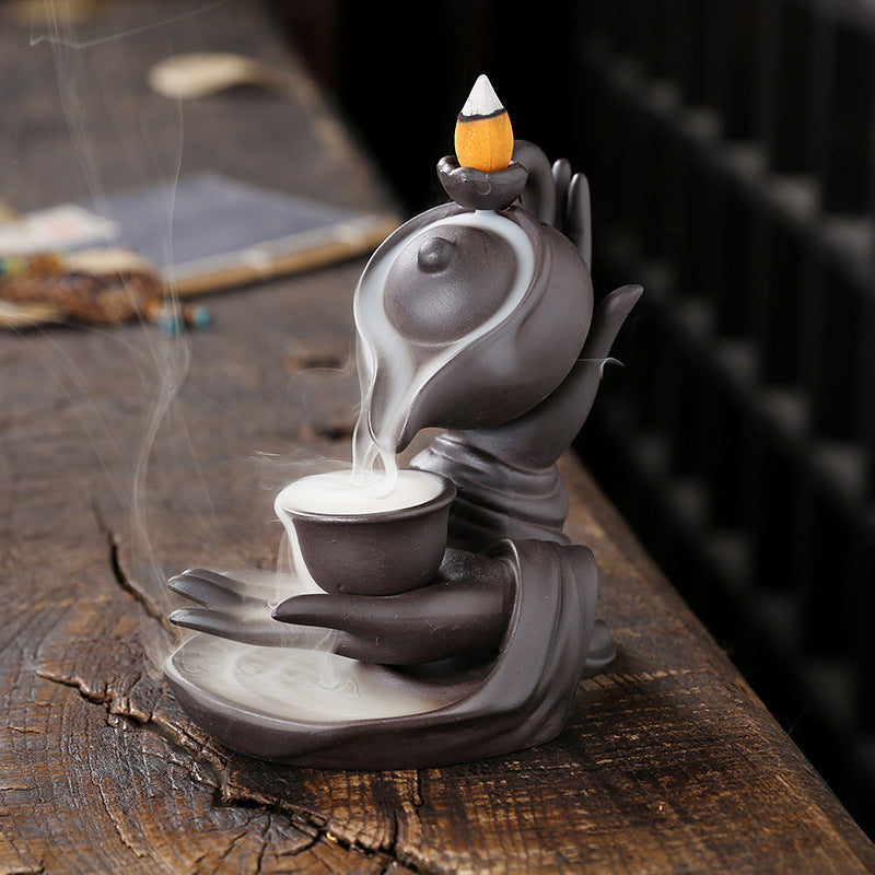 Zen-Inspired Handheld Teapot for Aromatherapy and Relaxation
